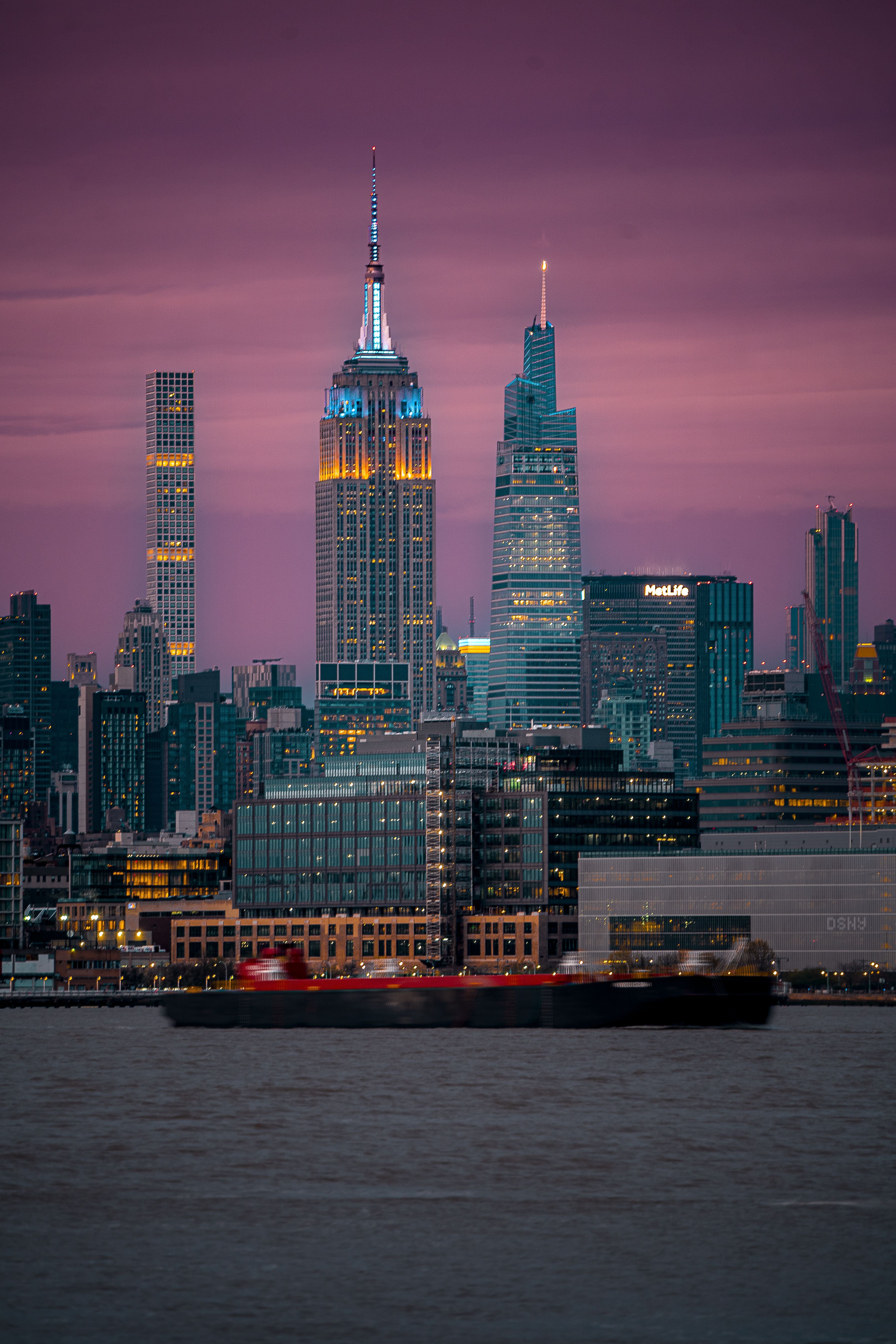New York City skyline at sunset featuring the Empire State Building